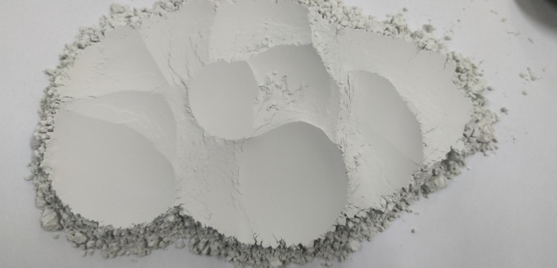 How should refractory cement be used?